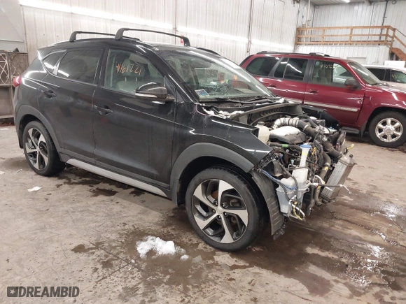 2018 Hyundai Tucson Value with VIN KM8J3CA28JU648236, listed as a IAAI auction lot 41161221 with 104,057 mi miles. Bid and sale history available at carsss.com. Image 1.