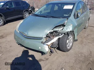2006 Toyota Prius z VIN JTDKB20U863179722, wystawiony jako IAAI lot #42055785 z przebiegiem Nie podano mil oraz . Historia ofert i sprzedaży dostępna na DreamBid. Obrazek 6.