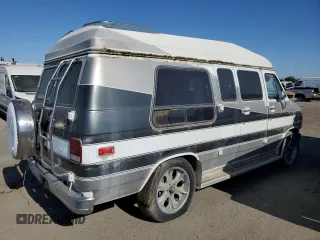 1989 Chevrolet Chevy Van z VIN 1GBEG25KXK7127909, wystawiony jako Copart lot #59997315 z przebiegiem 550 289 mil mil oraz Czysty tytuł • Clean title. Historia ofert i sprzedaży dostępna na DreamBid. Obrazek 3.