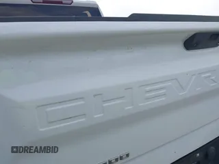 2021 Chevrolet Silverado 1500 Work Truck with VIN 1GCRYAEF0MZ210103, listed as a IAAI auction lot 41895696 with 80,098 mi miles and . Bid and sale history available at DreamBid. Image 19.