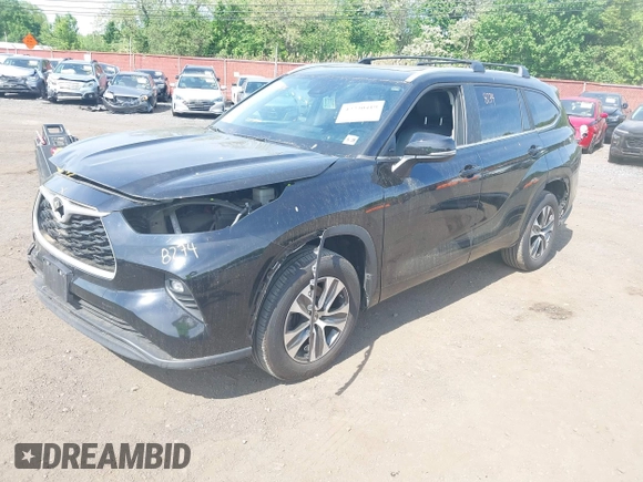 2023 Toyota Highlander L with VIN 5TDKDRBHXPS030361, listed as a IAAI auction lot 42230419 with 59,404 mi miles and . Bid and sale history available at DreamBid. Image 18.