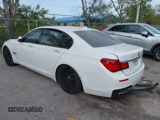 2013 BMW 7 Series 740i with VIN WBAYA6C52DD143862, listed as a IAAI auction lot 41859183 with 133,666 mi miles. Bid and sale history available at carsss.com. Image 3.