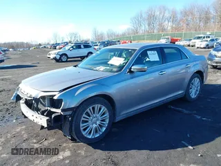 2014 Chrysler 300 C with VIN 2C3CCAKG2EH273274, listed as a IAAI auction lot 41638665 with 164,888 mi miles and . Bid and sale history available at carsss.com. Image 2.