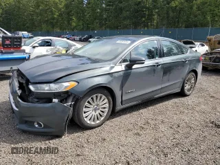 2015 Ford Fusion SE Hybrid with VIN 3FA6P0LU7FR161447, listed as a Copart auction lot 56061015 with 154,205 mi miles and Salvage title. Bid and sale history available at DreamBid. Image 1.