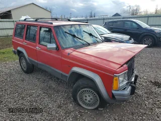 1996 Jeep Cherokee Country with VIN 1J4FJ78S5TL287631, listed as a Copart auction lot 79755834 with 195,365 mi miles and Salvage Title. Bid and sale history available at carsss.com. Image 4.
