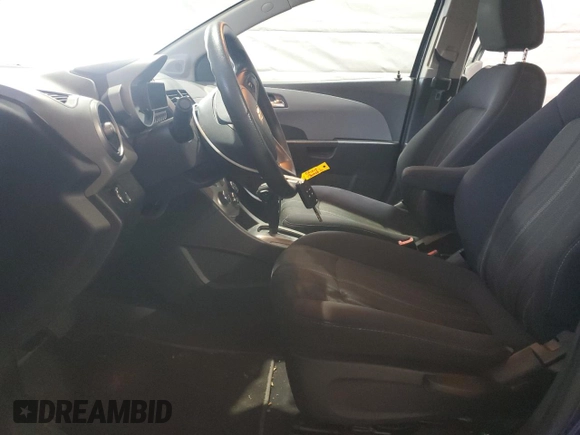2013 Chevrolet Sonic LT with VIN 1G1JC5SBXD4169554, listed as a Copart auction lot 49918815 with 83,893 mi miles and Clean Title. Bid and sale history available at DreamBid. Image 7.