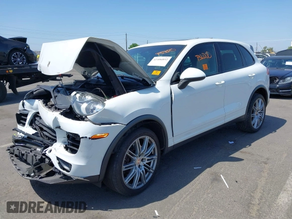 2016 Porsche Cayenne with VIN WP1AA2A22GKA37187, listed as a IAAI auction lot 42406852 with 70,686 mi miles and . Bid and sale history available at DreamBid. Image 2.