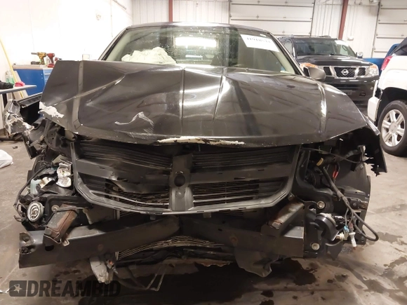 2009 Dodge Avenger SE with VIN 1B3LC46B29N525809, listed as a IAAI auction lot 41918533 with 147,269 mi miles and . Bid and sale history available at carsss.com. Image 6.