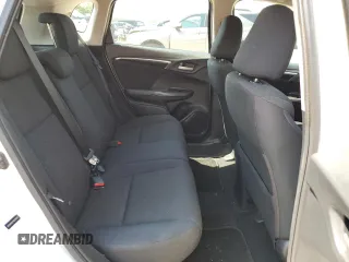 2015 Honda Fit EX-L z VIN 3HGGK5H81FM734945, wystawiony jako Copart lot #61920835 z przebiegiem 59 891 mil mil oraz Szkoda całkowita • Salvage title. Historia ofert i sprzedaży dostępna na DreamBid. Obrazek 10.