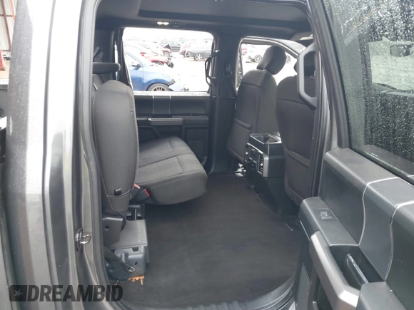 2019 Ford F-150 XL with VIN 1FTEW1C56KKC31025, listed as a IAAI auction lot 41452618 with 153,422 mi miles and . Bid and sale history available at DreamBid. Image 8.