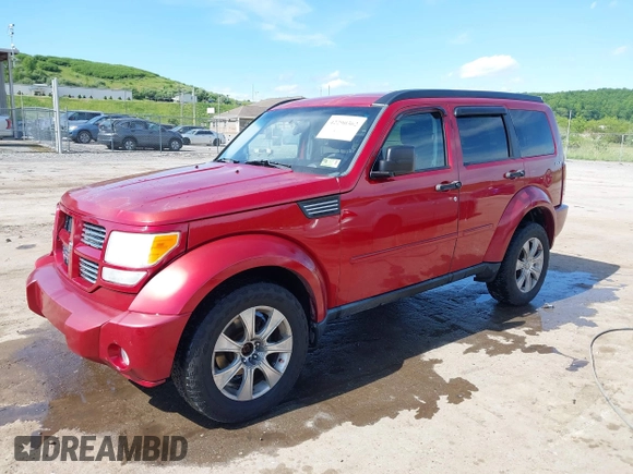 2010 Dodge Nitro Heat z VIN 1D4PU4GK5AW174777, wystawiony jako IAAI lot #42290362 z przebiegiem 165 537 mil mil oraz . Historia ofert i sprzedaży dostępna na DreamBid. Obrazek 2.
