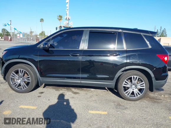 2021 Honda Passport EX-L with VIN 5FNYF7H56MB012736, listed as a IAAI auction lot 41820979 with 47,663 mi miles. Bid and sale history available at carsss.com. Image 14.