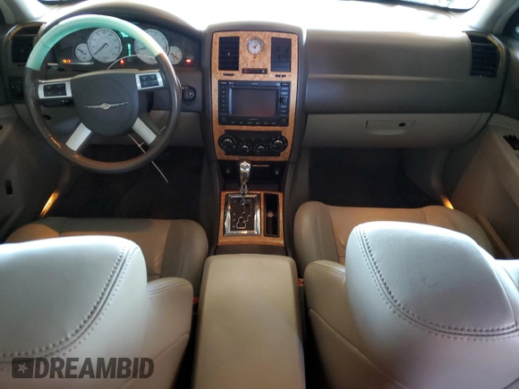2007 Chrysler 300 C z VIN 2C3LA63H67H776240, wystawiony jako Copart lot #54267355 z przebiegiem 121 357 mil mil oraz Szkoda całkowita • Salvage title. Historia ofert i sprzedaży dostępna na DreamBid. Obrazek 8.