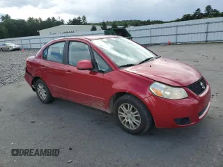 2012 Suzuki SX4 LE with VIN JS2YC5A34C6300079, listed as a Copart auction lot 68414434 with 111,661 mi miles and Salvage Title. Bid and sale history available at carsss.com. Image 4.