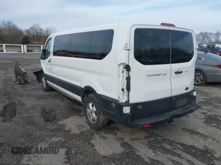 2019 Ford Transit Passenger XL z VIN 1FBZX2ZM2KKB63281, wystawiony jako IAAI lot #41859263 z przebiegiem 39 294 mil mil oraz . Historia ofert i sprzedaży dostępna na DreamBid. Obrazek 3.