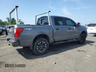 2018 Nissan Titan SV with VIN 1N6AA1E50JN514802, listed as a Copart auction lot 62342875 with 101,593 mi miles and Salvage title. Bid and sale history available at DreamBid. Image 3.