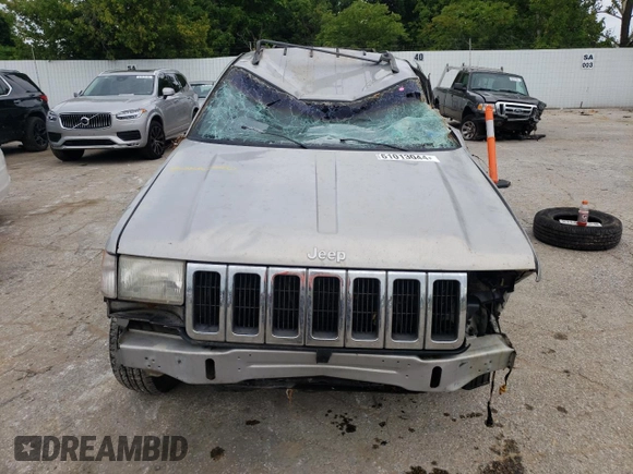 1996 Jeep Grand Cherokee Laredo with VIN 1J4GZ58S2TC401845, listed as a Copart auction lot 61013044 with 0 mi miles and Salvage Title. Bid and sale history available at carsss.com. Image 5.