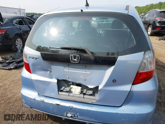 2009 Honda Fit with VIN JHMGE88209S052443, listed as a IAAI auction lot 42406572 with 140,343 mi miles and . Bid and sale history available at DreamBid. Image 15.