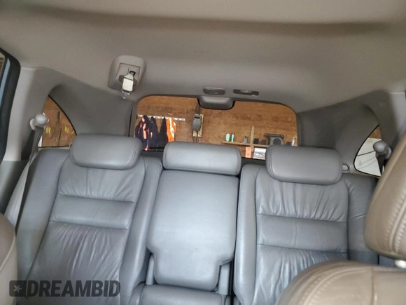 2009 Honda CR-V EX-L z VIN 5J6RE487X9L069169, wystawiony jako Copart lot #58907595 z przebiegiem 114 289 mil mil oraz Szkoda całkowita • Salvage title. Historia ofert i sprzedaży dostępna na DreamBid. Obrazek 10.
