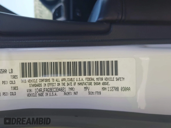 2014 Jeep Grand Cherokee Laredo with VIN 1C4RJFAG9EC334021, listed as a IAAI auction lot 42128823 with 161,741 mi miles. Bid and sale history available at carsss.com. Image 9.