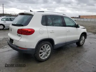 2012 Volkswagen Tiguan S with VIN WVGBV7AX5CW559037, listed as a Copart auction lot 51073435 with 56,620 mi miles and Salvage Title. Bid and sale history available at DreamBid. Image 3.