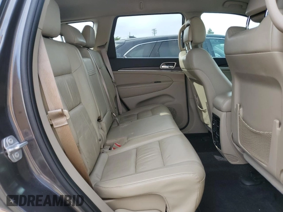 2016 Jeep Grand Cherokee Limited with VIN 1C4RJFBG3GC312873, listed as a Copart auction lot 56943705 with 134,633 mi miles and Salvage title. Bid and sale history available at DreamBid. Image 11.