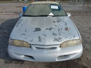 1995 Ford Thunderbird LX with VIN 1FALP62WXSH147871, listed as a IAAI auction lot 41878652 with 95,305 mi miles. Bid and sale history available at carsss.com. Image 6.