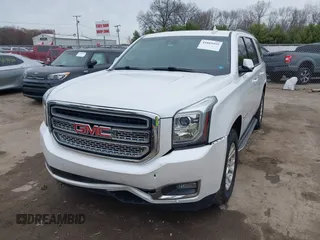 2016 GMC Yukon SLT with VIN 1GKS2BKC5GR374815, listed as a IAAI auction lot 41889495 with 163,464 mi miles. Bid and sale history available at carsss.com. Image 18.