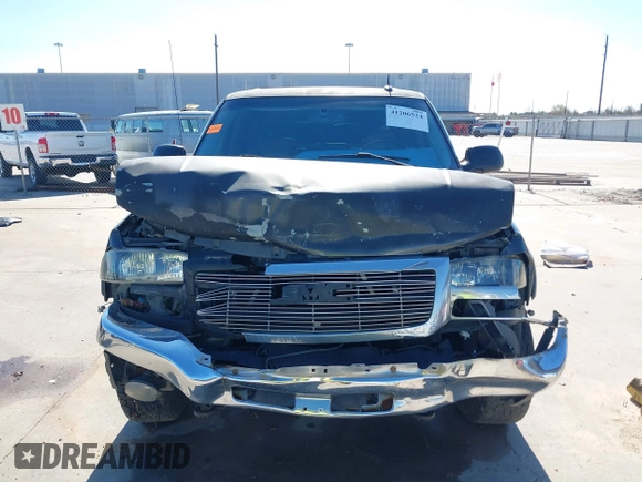 2003 GMC Sierra 1500HD SLE z VIN 1GTGC13U53F203980, wystawiony jako IAAI lot #41206524 z przebiegiem 309 414 mil mil oraz . Historia ofert i sprzedaży dostępna na DreamBid. Obrazek 13.