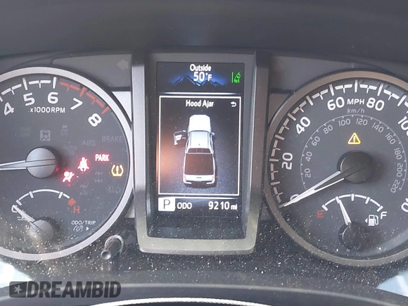 2023 Toyota Tacoma SR with VIN 3TMCZ5AN2PM553928, listed as a IAAI auction lot 40999044 with 9,210 mi miles and . Bid and sale history available at DreamBid. Image 7.