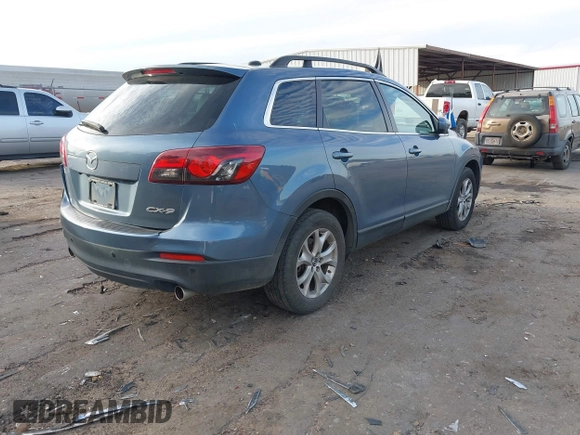 2014 Mazda CX-9 Touring with VIN JM3TB2CA0E0426597, listed as a IAAI auction lot 41646470 with 238,029 mi miles. Bid and sale history available at carsss.com. Image 4.