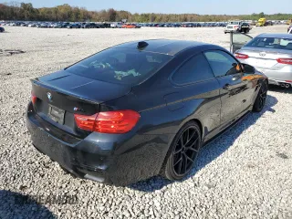 2015 BMW M4 with VIN WBS3R9C54FK334052, listed as a Copart auction lot 67044522 with 69,998 mi miles. Bid and sale history available at carsss.com. Image 4.