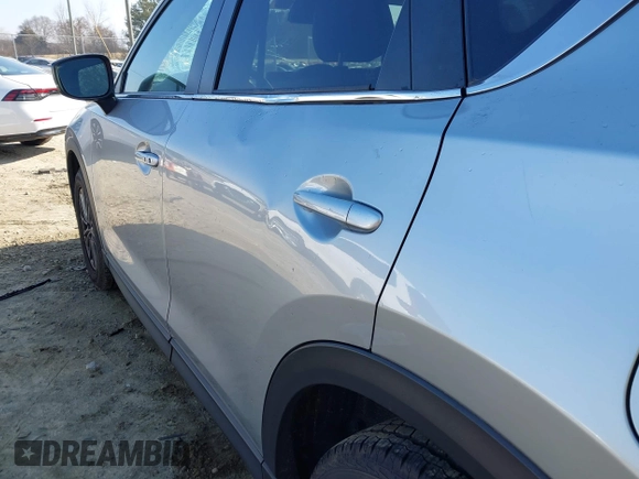 2020 Mazda CX-5 Touring with VIN JM3KFACM8L0727393, listed as a IAAI auction lot 41492627 with 91,521 mi miles. Bid and sale history available at carsss.com. Image 19.