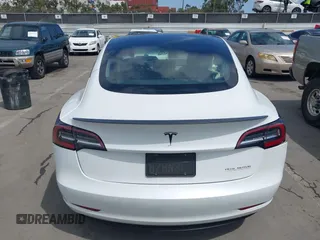 2021 Tesla Model 3 Performance with VIN 5YJ3E1EC2MF084594, listed as a IAAI auction lot 42030339 with 43,215 mi miles and . Bid and sale history available at DreamBid. Image 16.