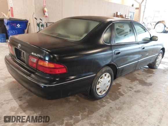 1998 Toyota Avalon XL with VIN 4T1BF18B7WU246141, listed as a IAAI auction lot 41405474 with 266,384 mi miles and . Bid and sale history available at DreamBid. Image 4.