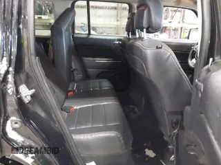 2014 Jeep Patriot Limited with VIN 1C4NJRCB8ED910340, listed as a IAAI auction lot 41396065 with 241,669 mi miles. Bid and sale history available at carsss.com. Image 8.