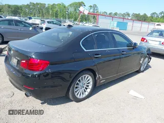2013 BMW 5 Series 535i with VIN WBAFR7C55DC822262, listed as a IAAI auction lot 42136544 with 111,541 mi miles and . Bid and sale history available at carsss.com. Image 4.