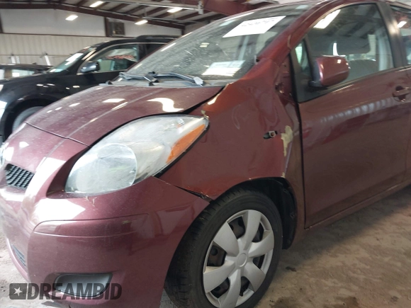2010 Toyota Yaris z VIN JTDKT4K37A5289171, wystawiony jako IAAI lot #42436707 z przebiegiem 118 810 mil mil oraz . Historia ofert i sprzedaży dostępna na DreamBid. Obrazek 6.