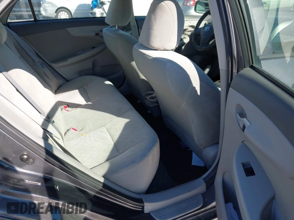 2009 Toyota Corolla with VIN JTDBL40E499070662, listed as a IAAI auction lot 41590923 with 148,295 mi miles. Bid and sale history available at carsss.com. Image 8.