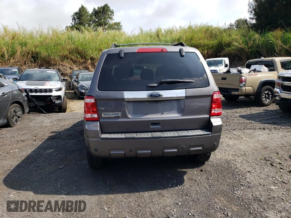 2011 Ford Escape Limited z VIN 1FMCU0E78BKB90916, wystawiony jako Copart lot #53715585 z przebiegiem 140 022 mil mil oraz Szkoda całkowita • Salvage title. Historia ofert i sprzedaży dostępna na DreamBid. Obrazek 6.