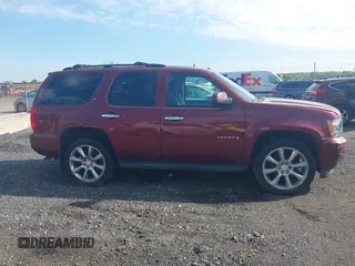 2009 Chevrolet Tahoe 2LT z VIN 1GNFK23079R138145, wystawiony jako IAAI lot #42109914 z przebiegiem 211 063 mil mil oraz . Historia ofert i sprzedaży dostępna na DreamBid. Obrazek 13.