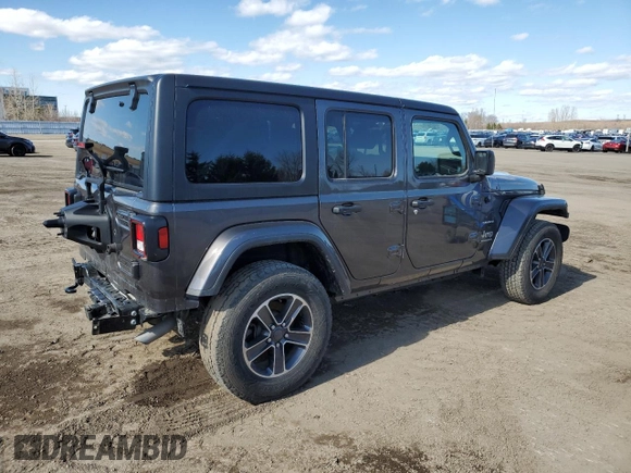 2023 Jeep Wrangler Sahara with VIN 1C4HJXEG5PW632336, listed as a Copart auction lot 54226405 with 23,735 mi miles and Salvage title. Bid and sale history available at DreamBid. Image 3.