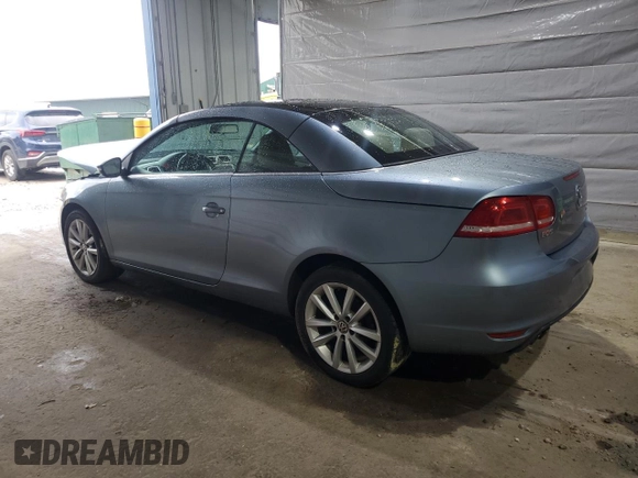 2012 Volkswagen Eos Komfort with VIN WVWBW7AH3CV000666, listed as a Copart auction lot 58509685 with 188,344 mi miles and Clean title. Bid and sale history available at DreamBid. Image 2.
