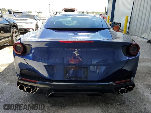 2019 Ferrari Portofino z VIN ZFF89FPAXK0242549, wystawiony jako Copart lot #74454234 z przebiegiem Nie podano mil oraz Nie do naprawy. Historia ofert i sprzedaży dostępna na DreamBid. Obrazek 6.