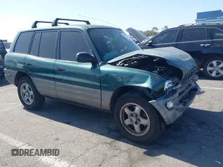 1998 Toyota RAV4 with VIN JT3GP10V4W0032068, listed as a IAAI auction lot 42323137 with 188,398 mi miles and . Bid and sale history available at DreamBid. Image 1.