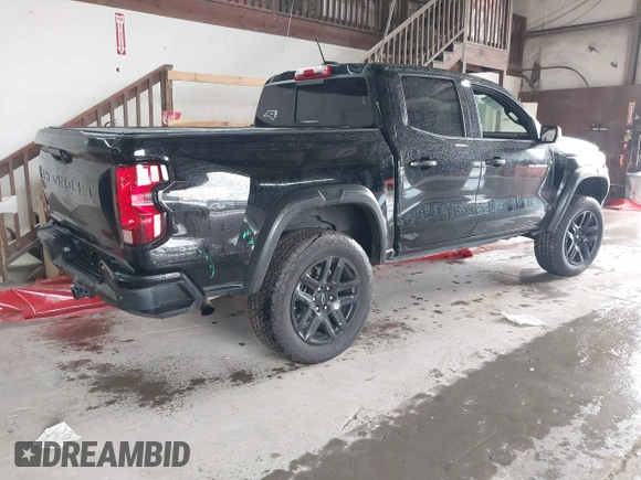 2023 Chevrolet Colorado 4WD Trail Boss with VIN 1GCPTEEK3P1261771, listed as a IAAI auction lot 42535710 with 30,000 mi miles and . Bid and sale history available at DreamBid. Image 4.