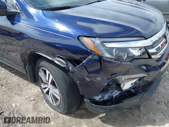 2018 Honda Pilot EX-L with VIN 5FNYF5H5XJB025960, listed as a IAAI auction lot 41843520 with 23,404 mi miles and . Bid and sale history available at DreamBid. Image 18.