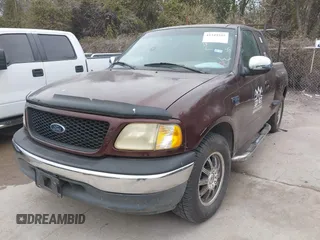 2001 Ford F-150 XL with VIN 2FTRX07W31CA59129, listed as a IAAI auction lot 41349352 with 272,026 mi miles. Bid and sale history available at carsss.com. Image 2.