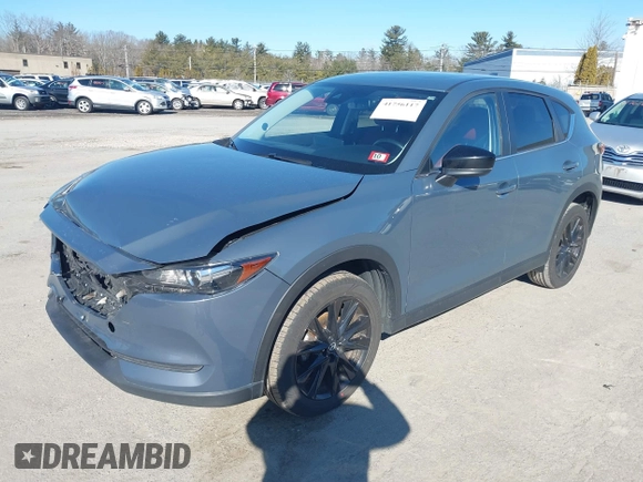 2021 Mazda CX-5 Touring with VIN JM3KFBCM0M0489644, listed as a IAAI auction lot 41756117 with 67,365 mi miles. Bid and sale history available at carsss.com. Image 17.