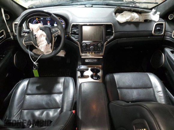 2015 Jeep Grand Cherokee Summit z VIN 1C4RJFJG1FC628532, wystawiony jako Copart lot #52546755 z przebiegiem 107 700 mil mil oraz Szkoda całkowita • Salvage title. Historia ofert i sprzedaży dostępna na DreamBid. Obrazek 8.